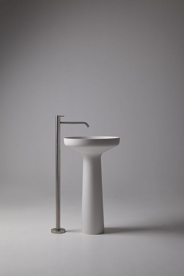 Modern freestanding bathtub with stylish floor-mounted faucet