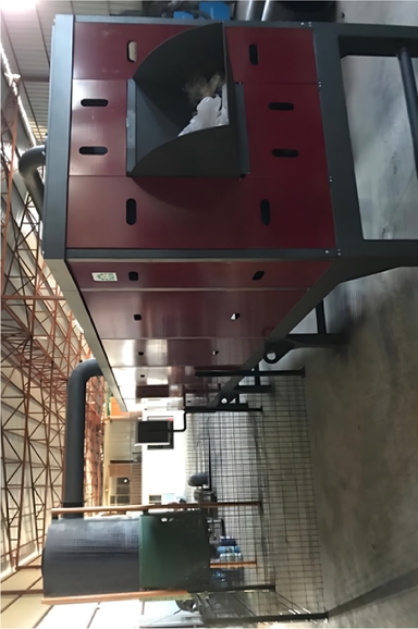 Waste feeding system for rotary kiln incinerator